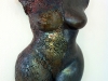 Torso med kopparoxid